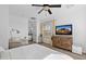 Serene bedroom with ensuite bathroom, featuring a ceiling fan and tasteful decor at 2239 N Calvin --, Mesa, AZ 85207