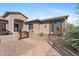 Charming home exterior with manicured landscaping, decorative iron gate, and inviting front entrance at 2239 N Calvin --, Mesa, AZ 85207