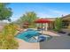 Backyard oasis featuring a sparkling pool, desert landscaping, and lounge area at 2239 N Calvin --, Mesa, AZ 85207