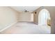 Spacious main bedroom featuring neutral carpet, ceiling fan, and ensuite bathroom access at 2329 W Keating Ave, Mesa, AZ 85202