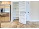 Pantry with ample storage space and easy access to the kitchen, next to the refrigerator at 2329 W Keating Ave, Mesa, AZ 85202