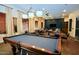 Well-appointed community clubhouse with a billiards table, lounge area, and dining area at 2989 N 44Th N St # 2007, Phoenix, AZ 85018