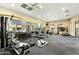Community fitness center with weight machines, free weights, and mirrors at 2989 N 44Th N St # 2007, Phoenix, AZ 85018