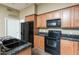 This well-equipped kitchen offers modern appliances, granite countertops, and functional design at 2989 N 44Th N St # 2007, Phoenix, AZ 85018