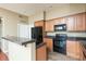 This kitchen features granite countertops, stainless steel appliances, and ample cabinet space for all your cooking needs at 2989 N 44Th N St # 2007, Phoenix, AZ 85018