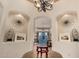 Grand foyer showcasing architectural details, decorative art, chandelier and elegant decor at 3166 N 158Th Ave, Goodyear, AZ 85395