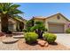 Charming single story with desert landscaping, featuring a walkway to the entryway at 3166 N 158Th Ave, Goodyear, AZ 85395