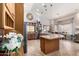 Bright kitchen features stainless appliances, a large island, and an eat-in nook at 3166 N 158Th Ave, Goodyear, AZ 85395