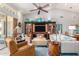 Inviting living room features a ceiling fan, entertainment center, and stylish decor at 3166 N 158Th Ave, Goodyear, AZ 85395