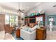 Bright living room with a ceiling fan, and scenic views through the windows at 3166 N 158Th Ave, Goodyear, AZ 85395