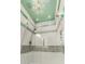 Modern shower with glass enclosure, tiled walls, and decorative accents at 3166 N 158Th Ave, Goodyear, AZ 85395