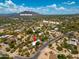 Aerial view of property highlighting nearby Cave Creek Rd, Black Mountain, neighborhood, and swimming pool at 33601 N Rifleman Rd, Cave Creek, AZ 85331