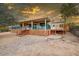 Desert home featuring a large back porch, patio space, and a low-maintenance yard at 33601 N Rifleman Rd, Cave Creek, AZ 85331