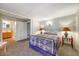 Inviting bedroom with a comfortable bed, a neutral color palette, and an en-suite bathroom at 33601 N Rifleman Rd, Cave Creek, AZ 85331