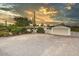 Charming single-story home with desert landscaping, separate garage, and expansive driveway at 33601 N Rifleman Rd, Cave Creek, AZ 85331