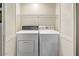 Functional laundry room showcases a washer and dryer, providing convenience for daily living at 33601 N Rifleman Rd, Cave Creek, AZ 85331