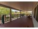 Inviting covered back porch featuring scenic desert views, and comfortable seating at 33601 N Rifleman Rd, Cave Creek, AZ 85331