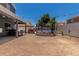Backyard featuring a patio, a trampoline and privacy walls at 3545 W Tanner Ranch Rd, San Tan Valley, AZ 85144