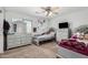 Bedroom showcasing beds, carpet flooring, dressers and a ceiling fan at 3545 W Tanner Ranch Rd, San Tan Valley, AZ 85144