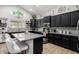 Beautiful kitchen featuring granite countertops, stainless steel appliances, and a breakfast bar at 3545 W Tanner Ranch Rd, San Tan Valley, AZ 85144