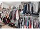Organized walk-in closet with double-hang shelving for maximum storage at 3545 W Tanner Ranch Rd, San Tan Valley, AZ 85144