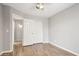 Neutral bedroom featuring tile floors, closet with sliding doors, and ceiling fan at 4428 E Yawepe St, Phoenix, AZ 85044