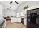 Bright eat-in kitchen featuring granite countertops and modern black appliances at 4428 E Yawepe St, Phoenix, AZ 85044
