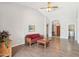 Spacious, bright living room with vaulted ceilings, tile flooring, and a ceiling fan at 4428 E Yawepe St, Phoenix, AZ 85044
