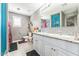 Bathroom featuring double sinks with white cabinets and large mirror at 45173 W Sandhill Rd, Maricopa, AZ 85139