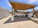 Spacious backyard with a covered patio area featuring a built-in grill and plenty of room for entertaining at 4639 W Keim Dr, Glendale, AZ 85301