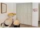 Bedroom with white shiplap closet doors and wood look floors at 4639 W Keim Dr, Glendale, AZ 85301
