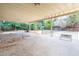 Large covered back patio with pool and wrought iron fence is perfect for outdoor living and entertaining at 4719 N 70Th St, Scottsdale, AZ 85251