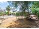 Landscaped backyard with mature trees and a fence surrounding the pool provides an escape from the summer heat at 4719 N 70Th St, Scottsdale, AZ 85251