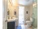 Bathroom features a walk-in shower, vanity sink, and direct access to the exterior at 4719 N 70Th St, Scottsdale, AZ 85251