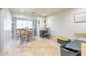 Versatile living space with natural light, travertine floors, and a casual seating arrangement at 4719 N 70Th St, Scottsdale, AZ 85251