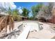 Backyard with an empty pool that has steps and diving board surrounded by desert landscaping at 4719 N 70Th St, Scottsdale, AZ 85251