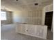 Spacious living room and kitchen area ready for your personalization at 47705 W Moeller Rd, Maricopa, AZ 85139
