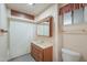 Bathroom featuring a vanity, toilet, and bathtub with shower curtain at 5228 E Des Moines St, Mesa, AZ 85205