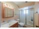 Bathroom featuring shower and vanity with ample lighting at 5228 E Des Moines St, Mesa, AZ 85205