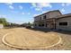 Large backyard with a circular layout is ready for sod and is great for outdoor activities, like trampolines and fire pits at 5402 S 54Th Ln, Laveen, AZ 85339