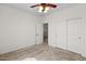 Bedroom featuring carpeted floors and large closet with doors at 5402 S 54Th Ln, Laveen, AZ 85339