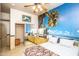 Bedroom with a tropical mural and double door closet at 6334 E Albany St, Mesa, AZ 85205