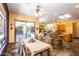 Open concept eat-in dining area with large sliding glass doors to the exterior at 6334 E Albany St, Mesa, AZ 85205