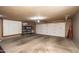 Spacious two car garage with storage cabinets and shelving units for organization at 6334 E Albany St, Mesa, AZ 85205