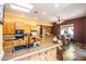 Spacious kitchen with granite counters, tile flooring, and bright, natural lighting at 6334 E Albany St, Mesa, AZ 85205