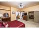Well lit main bedroom with ensuite bathroom, walk in closet, and plenty of natural light at 6334 E Albany St, Mesa, AZ 85205