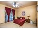 Bright main bedroom with a large slider leading to the back patio at 6334 E Albany St, Mesa, AZ 85205