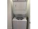 Laundry room featuring a stackable washer and dryer perfect for space saving in any home at 7040 W Olive Ave # 94, Peoria, AZ 85345