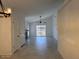 Spacious living room with tile flooring, fan and abundant natural light at 7040 W Olive Ave # 94, Peoria, AZ 85345