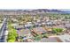 Expansive aerial view of a residential community with mature landscaping and mountain views at 710 W Ardmore Rd, Phoenix, AZ 85041